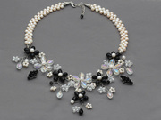 Pearl and Crystal Flower Crocheted Necklace Is US$24.69