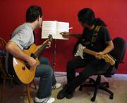 Cosmos Guitar Class | Guitar training classes in vadodara